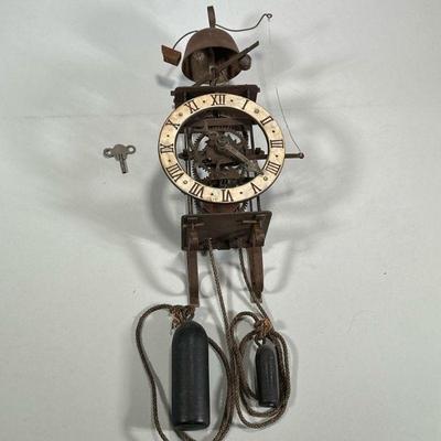 SKELETON WALL CLOCK | With two weights. - h. 17 x w. 6.5 x d. 5 in

