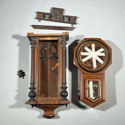 (2pc) CLOCK CASES/PARTS | Including: Empty regulator clock case with gilt accents, and carved wood wall clock case, missing glass but...