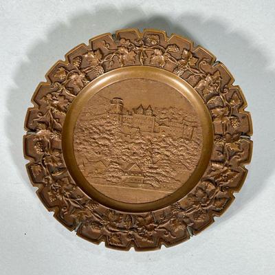 CAST BRONZE DECORATIVE PLATE | Cast Bronze plate with decorative European city relief with grape vine relief border. - dia. 8 in

