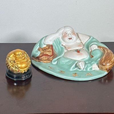 (2pc) PAIR BUDDHA STATUES | Including: ceramic lying down Buddha stature, and smaller gilt laughing Buddha statue. - h. 3 x w. 8 x l. 10...
