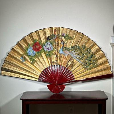 PEACOCK FAN | Monumental folding fan with gilt peacock design. - h. 40 x w. 66 in (fully extended)

