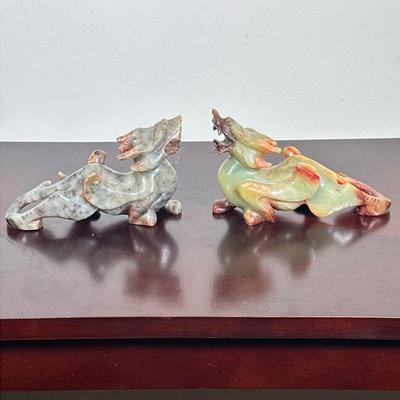 (2pc) PAIR CARVED JADE DRAGONS | Pair of carved jade dragon figurines. - h. 5 x w. 2 x l. 7 in

