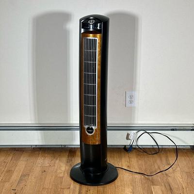 LASKO STANDING FAN | Lasko standing roaring fan with 3 speeds, timer, and faux wooden front. - h. 41 x dia. 12 in

