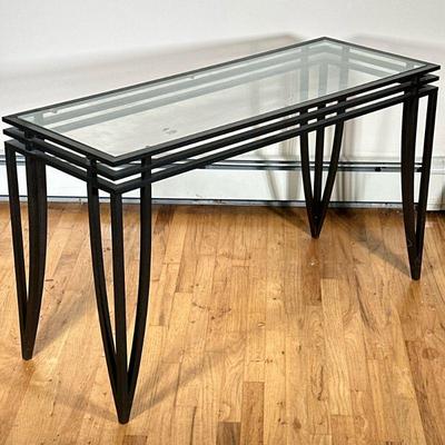 METAL & GLASS CONSOLE TABLE | Aluminum & glass-topped console table with splattered bronze paint. - h. 28 x w. 48 x d. 18 in Item...