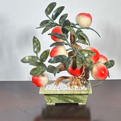 CARVED JADE PEACH BONSAI TREE | Carved jade peach bonsai tree with carved jade leaves and pot. - h. 14 x w. 8 x l. 12 in

