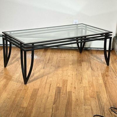GLASS-TOP COFFEE TABLE | Aluminum & glass-topped coffee table with splattered bronze paint. - h. 17.5 x w. 24 x l. 48 in

