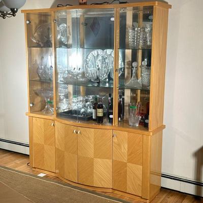 CONTEMPORARY ITALIAN HUTCH | Contemporary Italian China cabinet with curved breakfront, geometric blonde wood veneer, and 2 glass shelves...