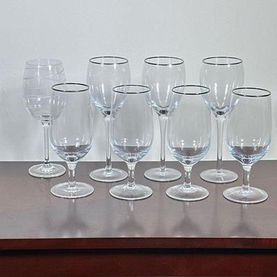 (8pc) MIKASA GLASSES | Mixed lot of Mikasa glasses including: 3 tall wine glasses, 1 wine glass, and 4 water goblets. - h. 9.25 x dia. 3...