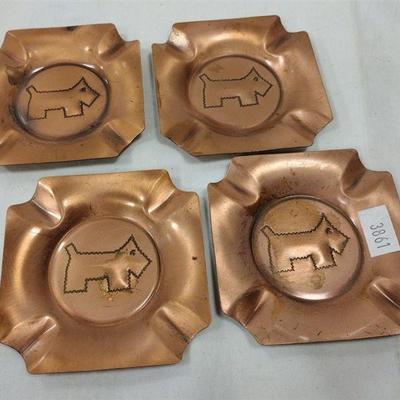 set of stamped copper Scottie dot ashtrays