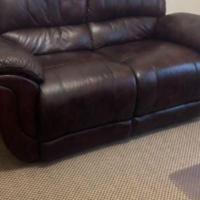 lovely dark brown leather loveseat