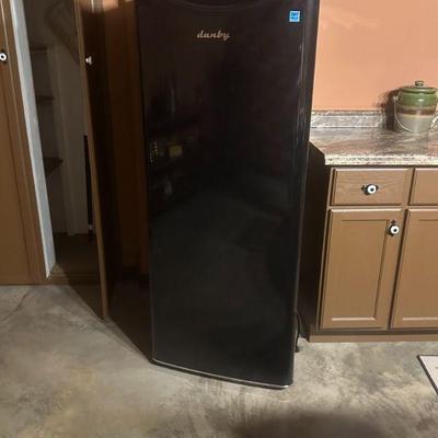 Danby apartment size refrigerator with top freezer.  Immaculatee