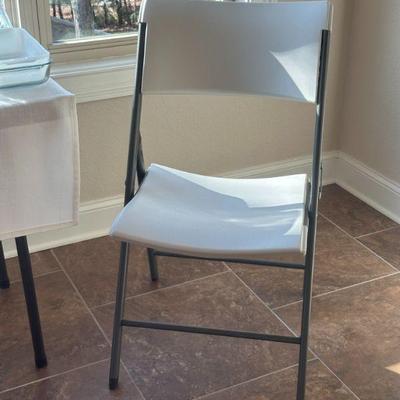 One of 4 folding chairs