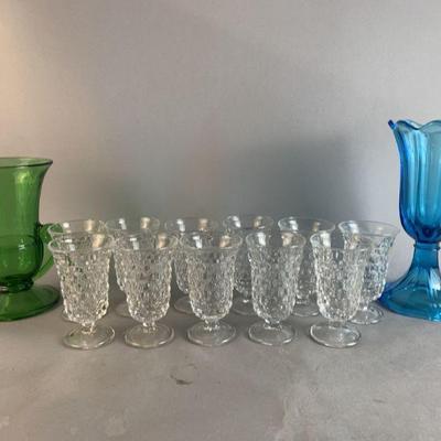 Lot 228 | Fostoria Tulip Vase, Footed Juice Glasses & More!
