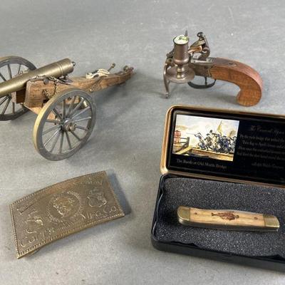 Sale Photo Thumbnail #224: Lot 213 | Antique Cannon, Flintstock, Brass Buckle & More
