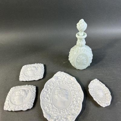 Lot 314 | Vintage J Lind & Fostoria Milk Glass Bottle & Lids
