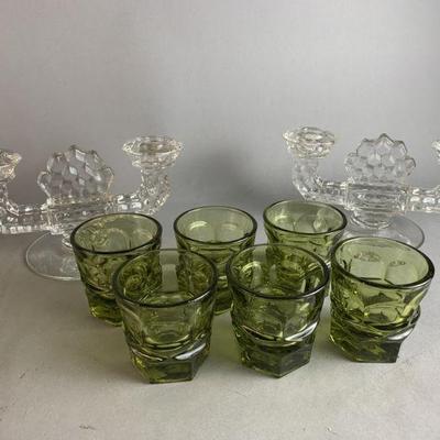 Lot 222 | Fostoria American Candleholders & Juice Glasses
