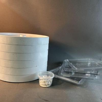 Lot 90 | Plastic Lazy Susan’s & Plastic Bin Lids
