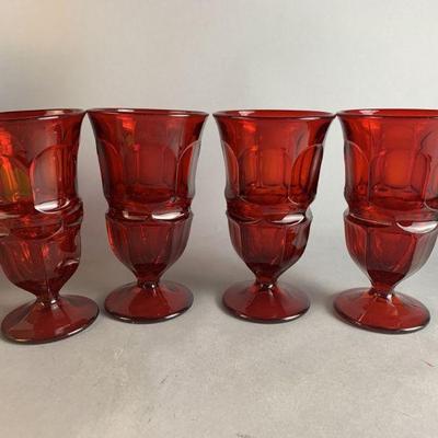 Lot 221 | 4 Argus Pressed Flint Ruby Footed Ice Tea Glasses
