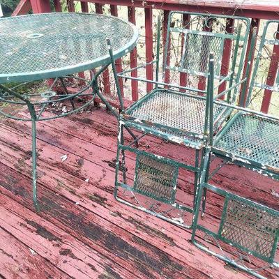 Iron table and 4 matching chairs
