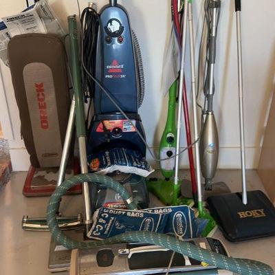 Electrolux with attachments 
Oreck upright vacuum
Swiffer dust mops (2)
Hoky (Oreck) manual carpet cleaner 
Bissell proheat2X carpet...