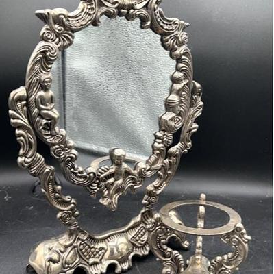 Vintage Silverplate Pair
Godinger silverplated Orb stand 3.5 x 3.5 in.
Vtg silverplated cherub vanity swivel tabletop mirror 9 x 12 in.