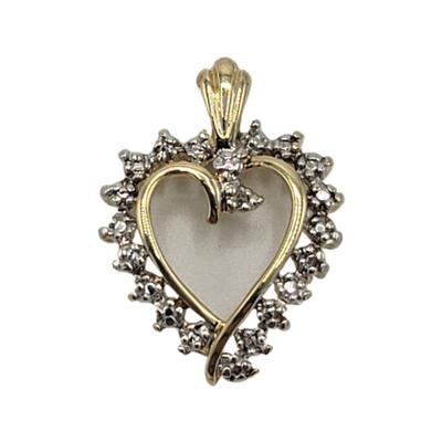 Lot 201
10k Heart Pendant Weight 1.93 grams (including stones) L 2cm W 1.6cm Estimated Melt Value: $68.25 as of (1/4/25) (including...