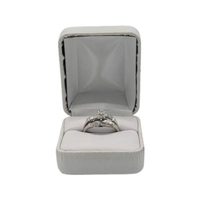 Lot 185
14k MW Co. Diamond Wedding Ring Hallmark MW Co Sz 9 Weight 3.81 grams (including stones) Estimated Melt Value: $190.04 as of...