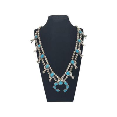 Lot 114
Vintage Navajo Turquoise Squash Blossom Necklace, Sterling Silver L 28" long Weight 104.43 Grams  Buyer is responsible to...