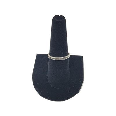 Lot 47
Sterling Ring Hallmarks Sterling / "Copyright" Circle / $ Sz 9 Weight: 1.88 grams   Estimated Melt Value: $ 1.56  as of...