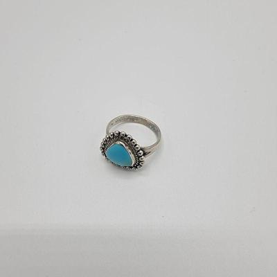 Lot 146
 Round Triangle Sterling Turqiouse Ring Hallmarked Sz 8 Weight: 4.44   Estimated Melt Value: $ 3.69  as of (01/07/2025) Buyer is...