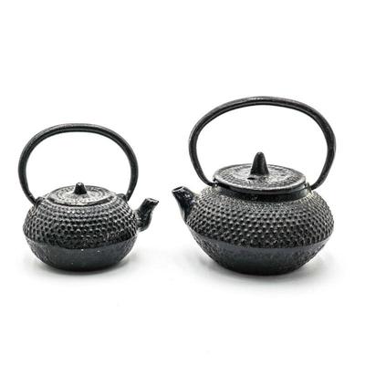 Pair of Miniature Cast Iron Teapots