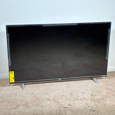 TCL Smart TV | Flat screen TCL Roku TV, aprox. 55 in.

