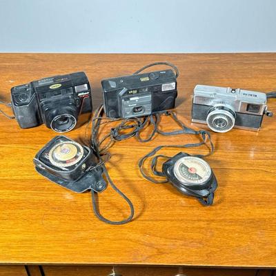 (5pc) Film Cameras & Meters | 35mm film cameras including a Nikeon Tele Touch camera, a Kodak VR 35, and an Olympus Quickmatic, plus...