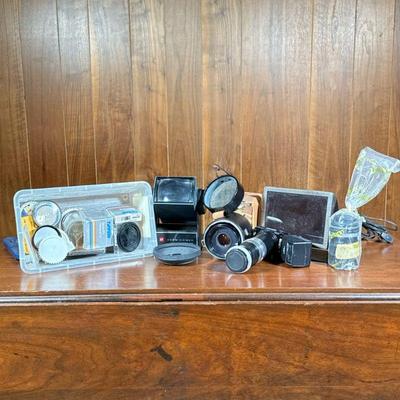 Group Camera Accessories | A large group of camera and photography accessories, including lenses, filters, etc.