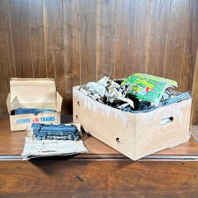 Lionel Train Collection | Various Lioinel tracks, locomotive, and electric accessories, plus other brands.