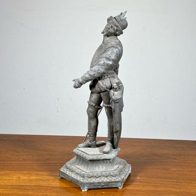 Cast Metal Statue | Statue of a gentleman in armor and feathered hat with a fencing sword. - h. 16.5 x w. 6.5 in

