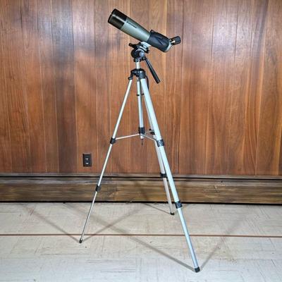 Celestron Spotting Scope | Celestron Ultima 80 angled spotting scope on tripod stand.

