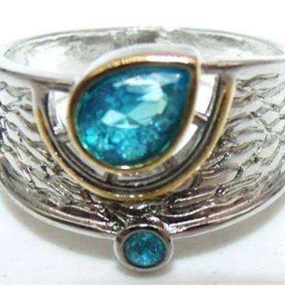 Lot 074   
Sterling silver ring blue stones