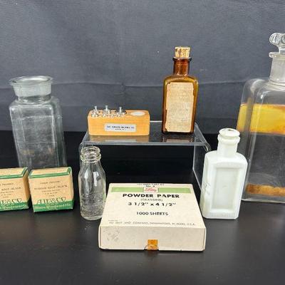 8 pieces of vintage pharmacy items decanters bottles powder paper