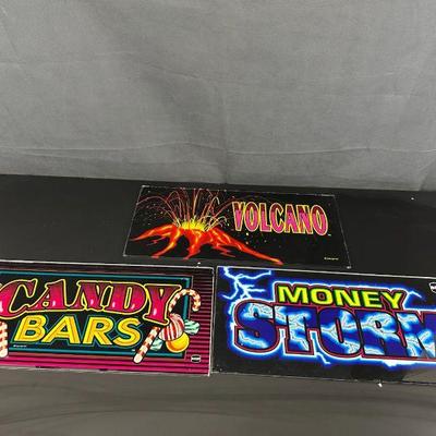 3 slot machine glass panels volcano money storm candy bars