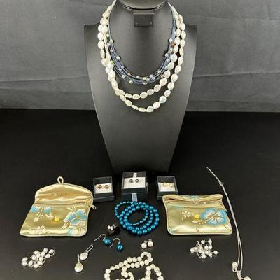 Variety of freshwater pearls baroque coin pearls rl sterling silver