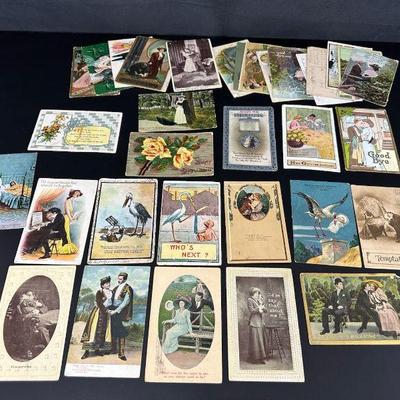 Lot of vintage post cards theme of baby wedding couples