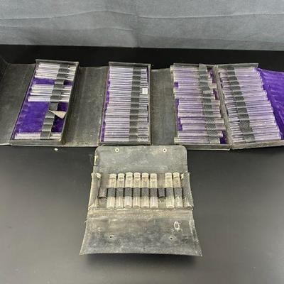Vintage black pharmacy case with test tubes and bottles