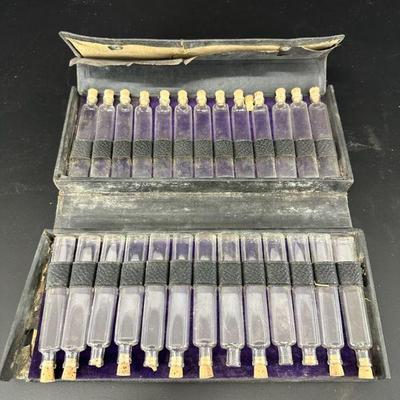 Vintage pharmacy case bottles with cork stopper bottles