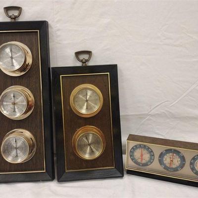 three plastic Springfield weather stations