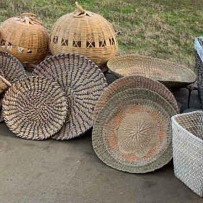 Set of four woven coil basket trays dimensions range from 13" to 18".
Set of three wicker wall baskets dimensions range from...
