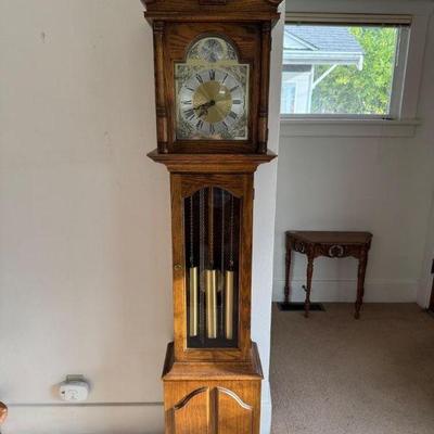 Howard Miller Petite Grandfather Clock in Rich Wood Finish	