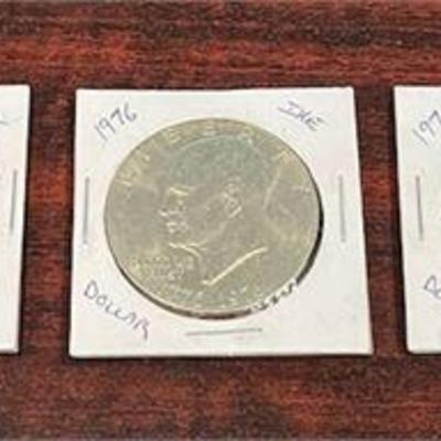 Lot 011 
(3) IKE DOLLARS 1776-1976