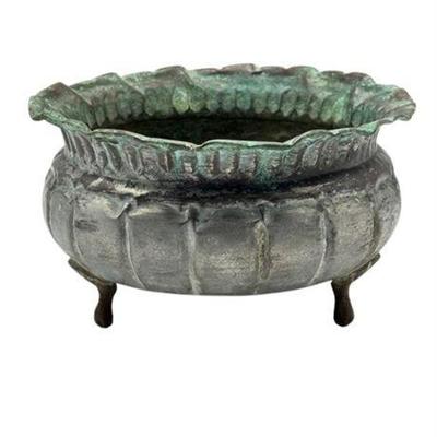 Lot 283   
Vintage Three Footed Copper Hand Hammered Bowl With Ruffled Lip
