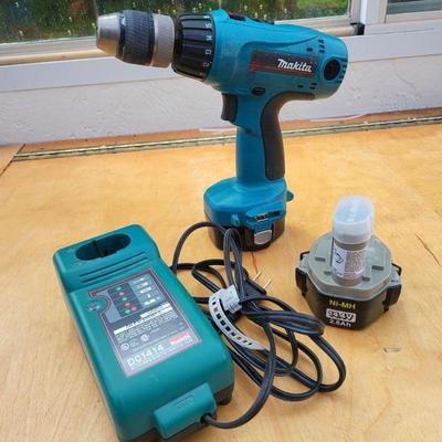 Makita Drill Model 6337D, Two Batteries, & DC1414 Charger